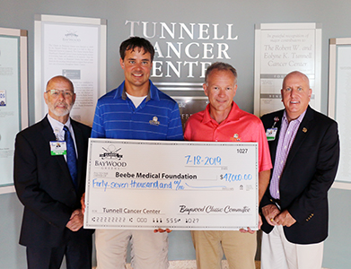 Barry Hamp, Executive Director of Beebe Healthcare’s Oncology Services; Robert Tunnell III; Lincoln Davis, chair of Baywood Golf Classic; and Thomas J. Protack, Vice President of Development for the Beebe Medical Foundation.